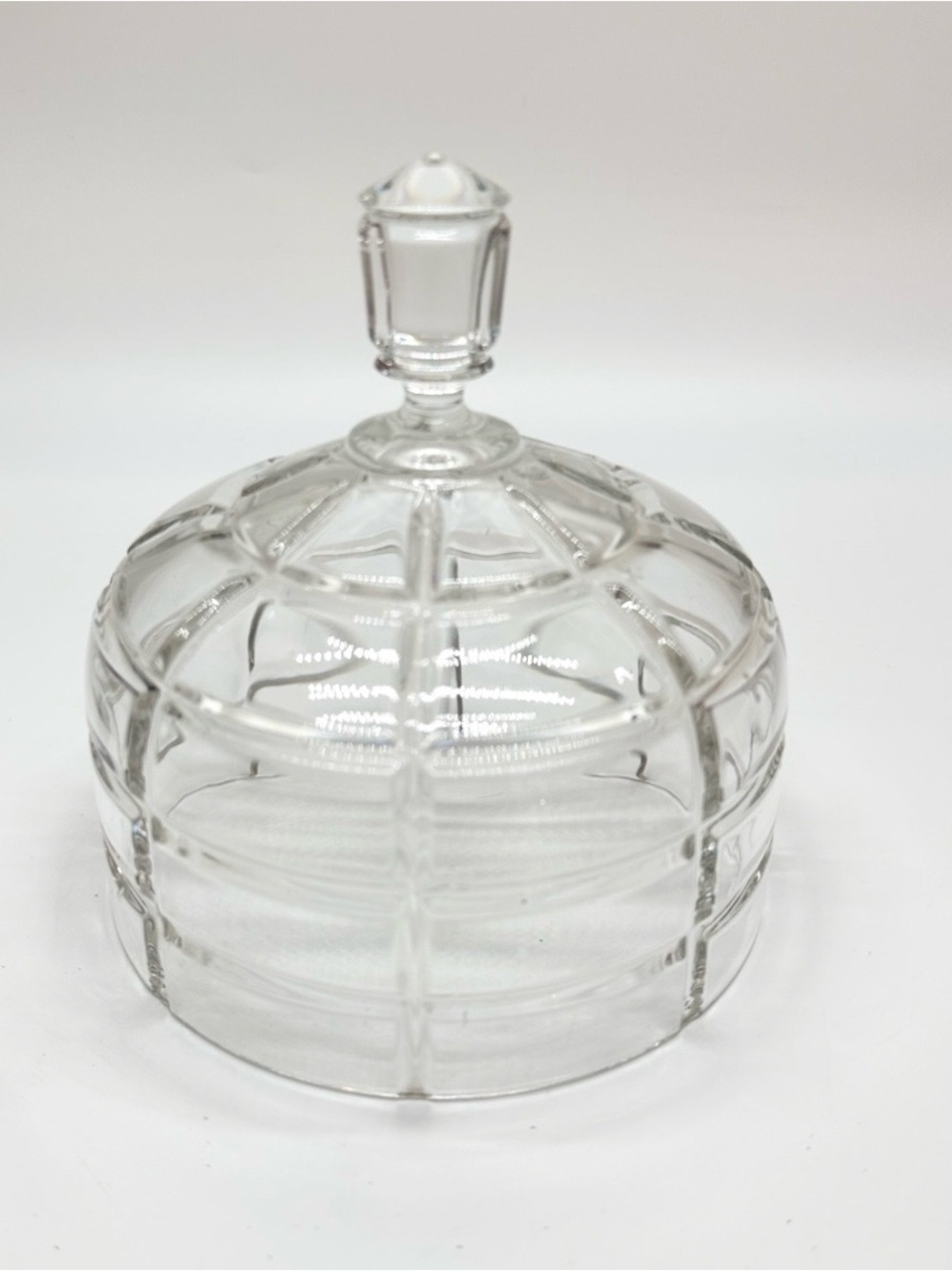 Vintage crystal candy dish lid with a pressed‎ glass design.